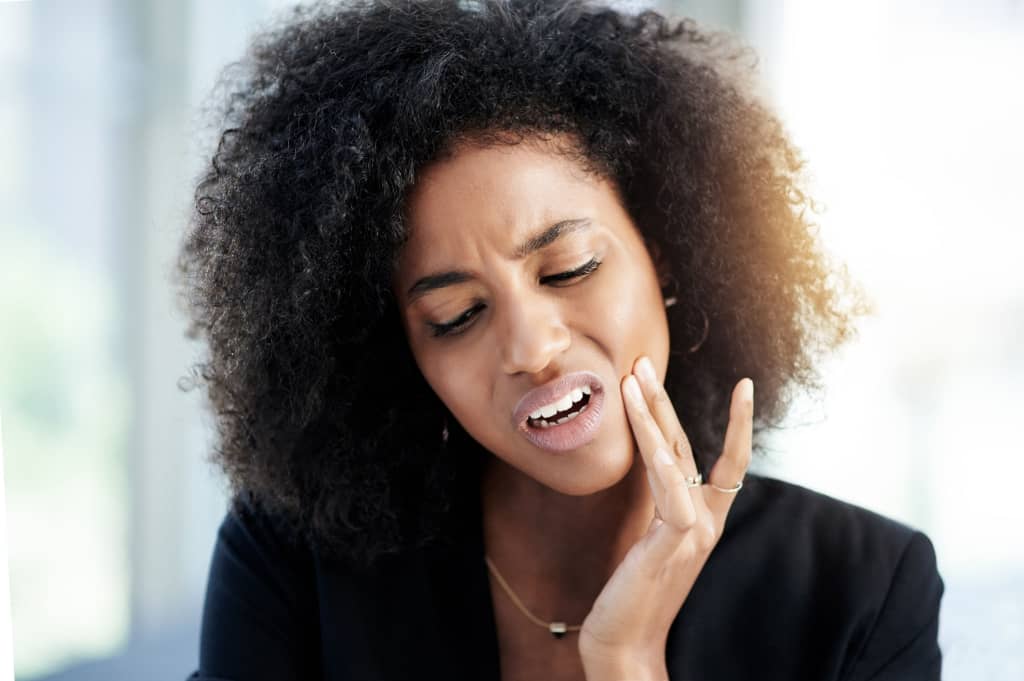 Woman Suffering Jaw Pain